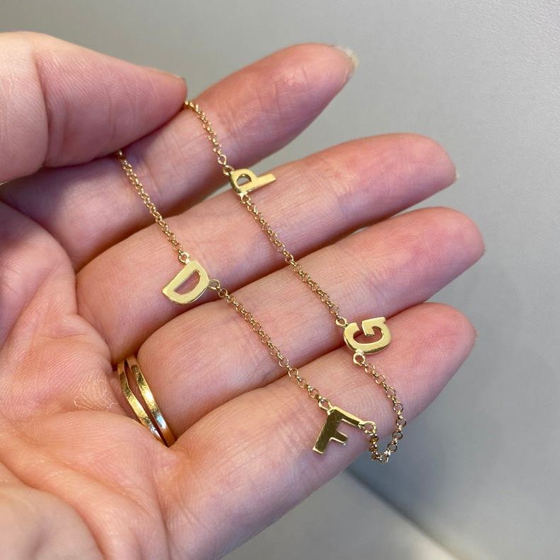 Pulseira Letras Ouro 18k